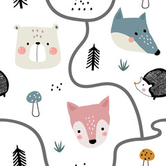 Semless woodland pattern with cute animal faces and hand drawn elements. Scandinaviann style childish texture for fabric, textile, apparel, nursery decoration. Vector illustration