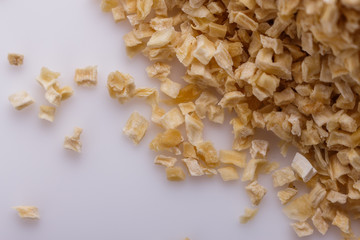 fragrant dried parsnip on a white acrylic background
