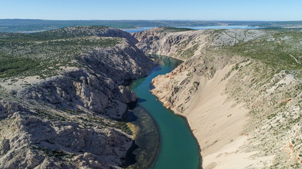 Zrmanja River in northern Dalmatia, Croatia is famous for its crystal clear waters and countless waterfalls surrounded by a deep canyon. This was a site of winnetou filming.