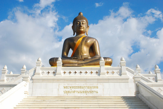 Big golden buddha statue at Wat Phutthathiwat temple in Betong, Yala, Thailand