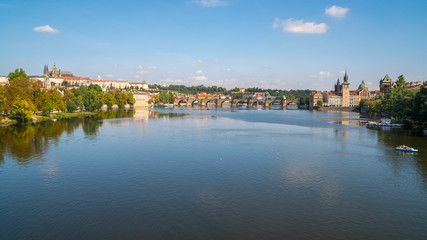Fototapeta na wymiar Pedestrians only Charles Bridge over Vltava river in Prague, Czech Republic