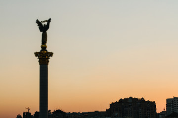 Fototapeta na wymiar Column of independent with sunset in Kyiv, Ukraine