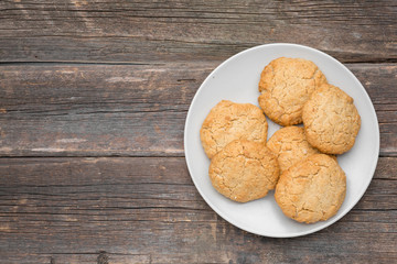 Homemade cookies on rustic wooden background