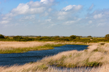 Dungeness, Kent, UK. Blue waterway.