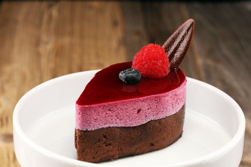 Delicious raspberry cake with fresh raspberries, blueberry and lemon cake.  confiserie cake cuisine.