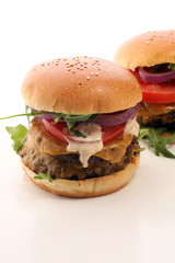 Tasty fresh meat burgers with salad and cheese. Homemade angus burger.