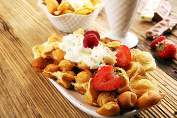 Hong Kong style egg waffle on wooden board. bubble waffle