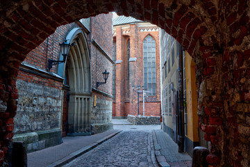 Fototapeta na wymiar Morning street in medieval town of old Riga city