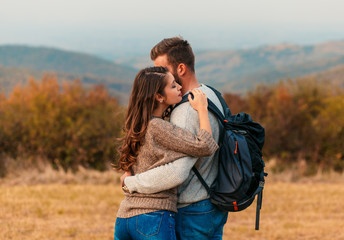 Young couple enjoying hiking in nature.