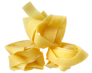 pasta pappardelle nest top view close up on a isolated