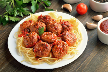 Fried meatballs and spaghetti