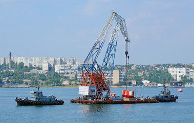 Установка бакенов, обозначающих стоянку кораблей, в...