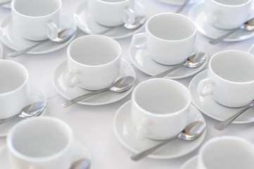 Set of empty white mugs 