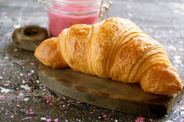 Croissants with jam and berries for Breakfast.