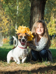 Happy kids with dog in park
