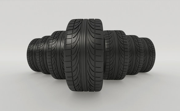 3D rendering. Group of car tires on a background white