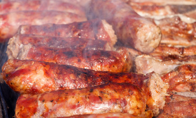 Close up of sausages on barbecue