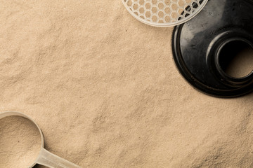 Scoops filled with protein powders for fitness nutrition