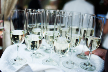 Many champagne glasses on the presentation