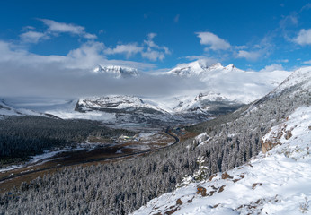 Fototapeta na wymiar Moody clouds after an alpine snow storm