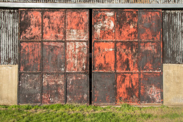 Barn doors on the farm, metal and rusty.