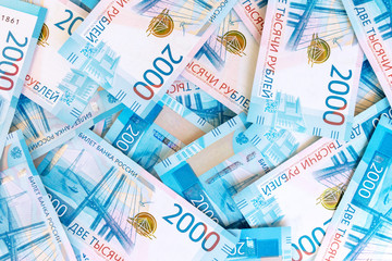 Background Of Paper Russian Money. New Russian Banknotes Of 2000 Two Thousands Rubles.