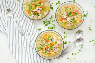 Bowls of Chicken Noodle Soup with Vegetables