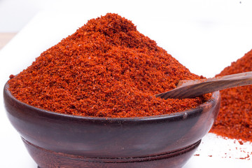 red chili powder isolated on white background 