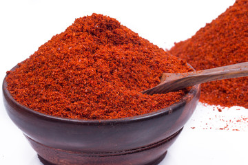 red chili powder isolated on white background 