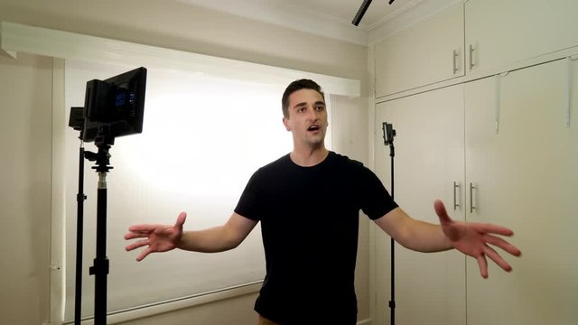 Actor in studio doing audition with lighting set up