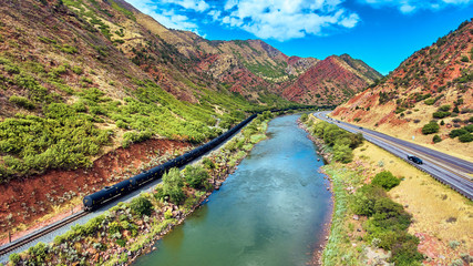 Aerial Train Glenwood Canyons Red Rocks in Colorado Colorado River