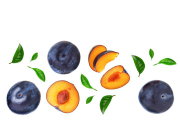 plums with leaf isolated on a white background with copy space for your text. Top view. Flat lay pattern