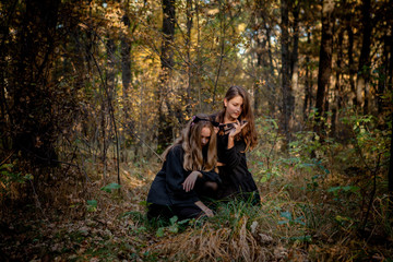 Fototapeta premium Halloween Maniac and Witch in the Forest