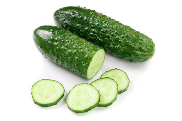 Cucumber slices isolated on white background. Top view. Flat lay pattern