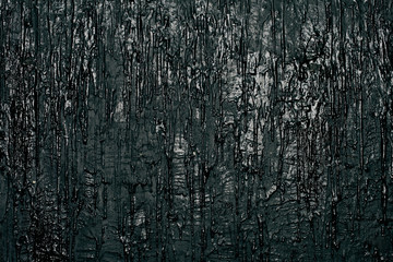 Wall with black flowing paint, art background