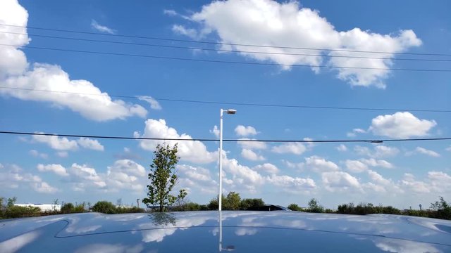 sky view with traffic, taken from the top of a car 4k@60fps