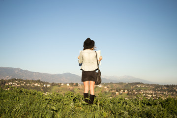 Fototapeta premium woman explores the hills