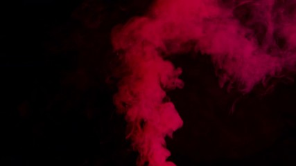 red bomb smoke on black background
