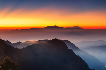 Silhouette Volcanoes mountains in Bromo Tengger Semeru National Park during Sunriset. Java, Indonesia