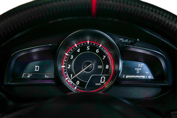  Speed meter is gauge that measurement and display,Closeup dashboard of mileage car with light red