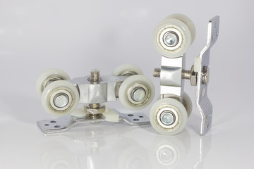 Closeup, castors, sliding doors.