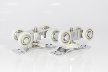 Closeup, castors, sliding doors.