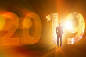 Businessman in the concept of transition to year 2019