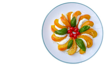Image of Mozzarella Italian salad food make from Tomatoes, basil leaves, Balsamic and olive oil seasoning with salt and peppers can be serve for first course or salad dish accompany with main dish. 
