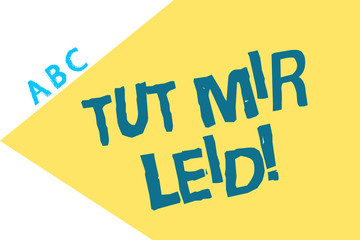 Text sign showing Tut Mir Leid. Conceptual photo Asking forgiveness for what have been done in the past.