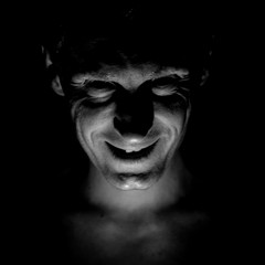 Stylish portrait of adult caucasian man. He smiles like maniac and seems like maniac or crazy....
