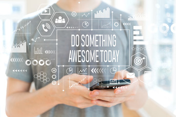 Do something awesome today with young man using a smartphone