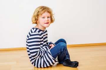 Child sitting on the floor