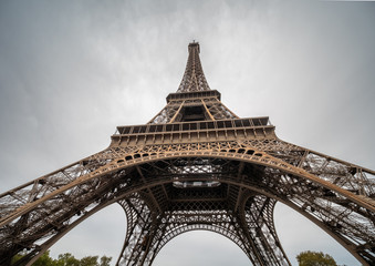 Large Image of the Eiffel Tower During the Day With Storm Clouds