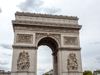 Fototapeta na wymiar Arch de triomphe with Storm Clouds in the sky